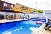 Private heated pool in back & Sandy beach in front